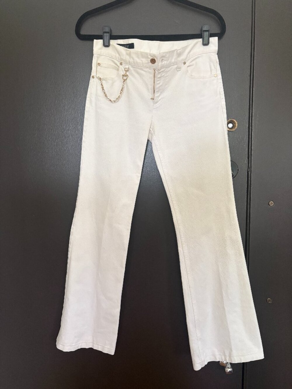 White vintage mid rise flared leg Gucci jeans with chain link